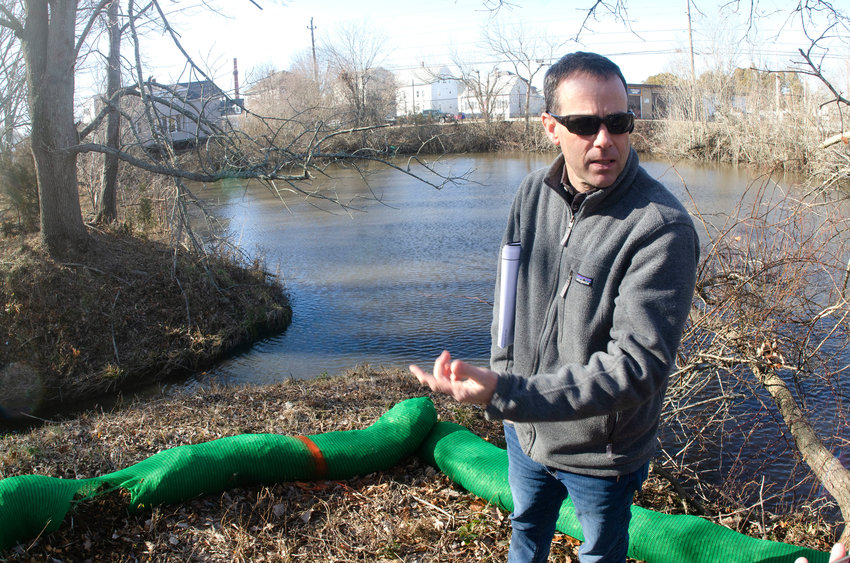 Ed Tanner, Bristol&rsquo;s Principal Planner, at the State Street Reservoir project. The area to his left, will remain untouched as it&rsquo;s the leading edge of a rookery for Back-crested night herons. The small stream to his right leads to a dam and the beginning of Tanyard Brook.  Most of the rest of the site has been engineered for larger stormwater capacity, and to send cleaner water down Tanyard Brook and eventually into Bristol Harbor.