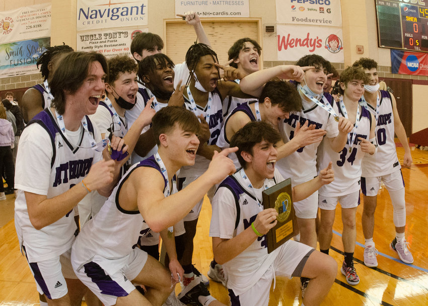 The Huskies pose for a photo after they beat Ponaganset 47-35 in the Division III championship at RIC on Sunday.