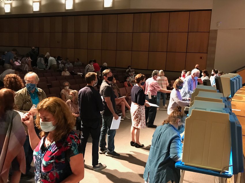 Barrington households carry a tax burden that is, on average, 12 percent higher than the next closest community. Pictured are taxpayers voting at last year&rsquo;s financial town meeting on whether to purchase the Carmelite Monastery property.