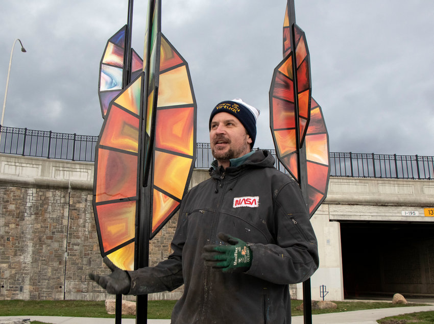 Artist Kirk Seese unveiled his piece, &ldquo;The Feathers Three,&rdquo; at the Waterfront Gateway Sculpture Garden in the Watchemoket Square Arts District on Saturday, March 26.