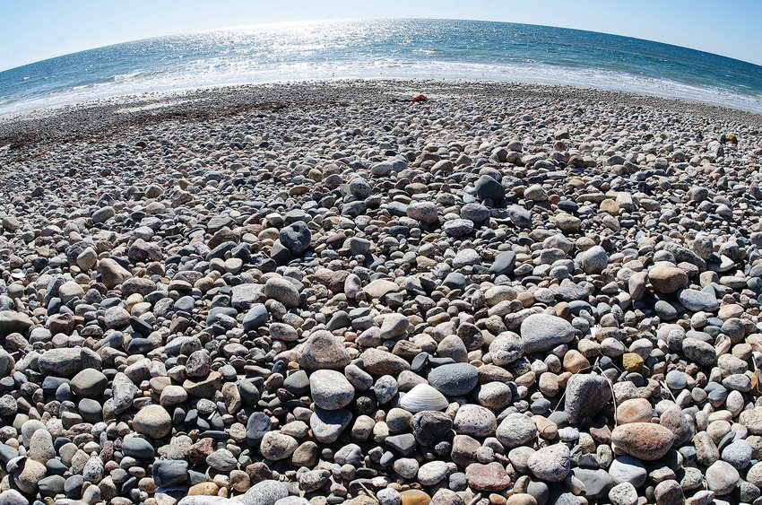 Thousands and thousands of cobblestones are shown on Horseneck Beach in this photo taken last month.