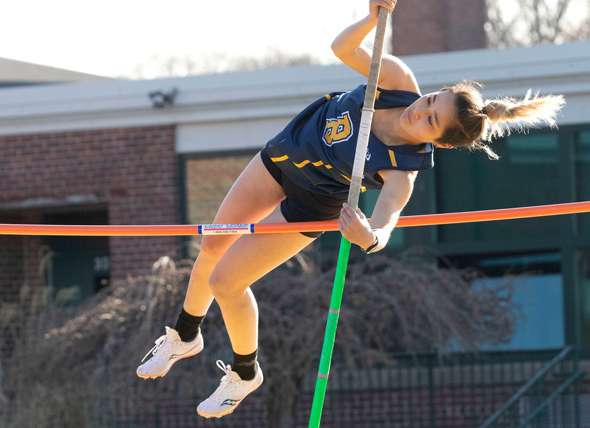 Barrington's Marie Choi-Schattle clears the bar in the pole vault event on Tuesday. Choi-Schattle finished first in the event.