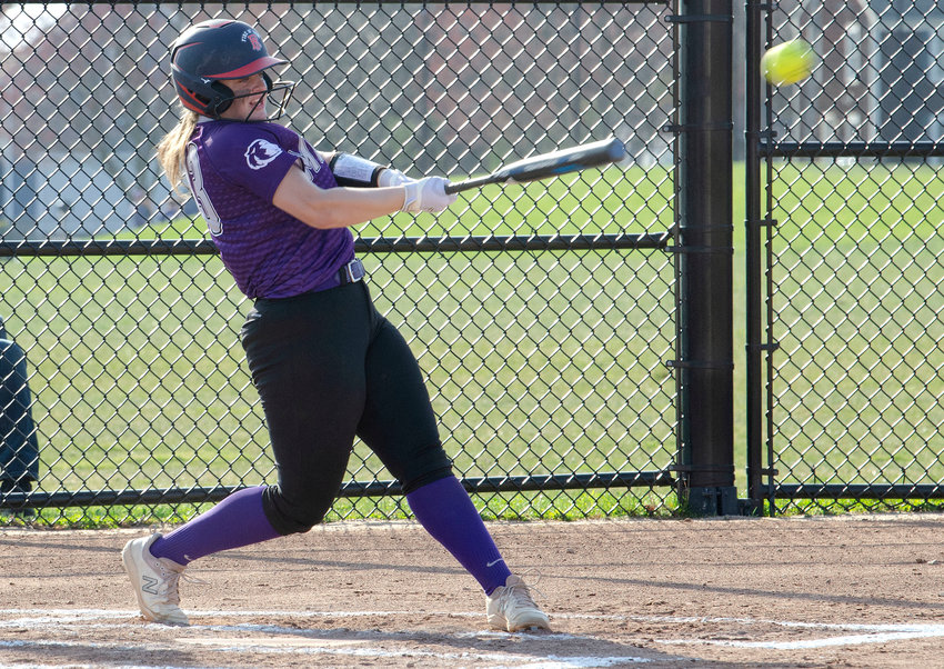 Clean up hitter Grace Stephenson smacks a three run homer to give the Huskies a 7-0 lead during their game against Exeter West Greenwich on Thursday. The Huskies went on to win the game 11-0 and have now won 5 straight games in Division II.
