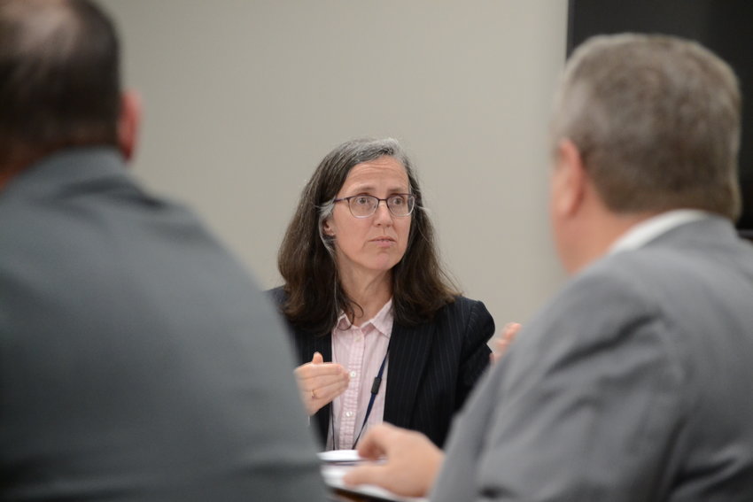 Department of Business Regulations hearing officer Catherine Warren speaks to attorneys from the Town of Warren last Tuesday morning at the Department of Administration headquarters in Providence.