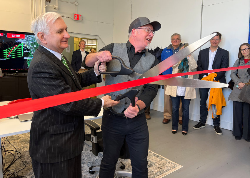 Senator Jack Read (l) and Ian Estaphan Owen, Managing Director of Jaia Robotics, cut the ribbon opening the Blue Tech Innovation Center at the Herreshoff Marine Museum.