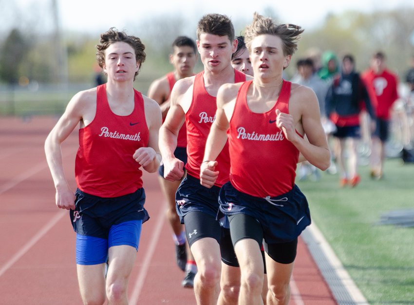 Portsmouth High&rsquo;s Chris Vachon, Kevin Sullivan and Kaden Kluth (from left) run in a pack during the 1,500 meter run at Monday&rsquo;s home track meet. Kluth would go on to win the event, and also set a new school record in winning the 3,000-meter run.