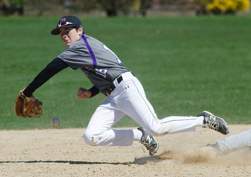 Huskies second baseman Dan Desilets missed a short throw from shortstop Dayton Van Amberg in an attempt to start a double play during Mt. Hope's home game against South Kingstown on Wednesday. Instead both runners were safe. The Huskies made a combined 15 errors in the South Kingstown away and home series.