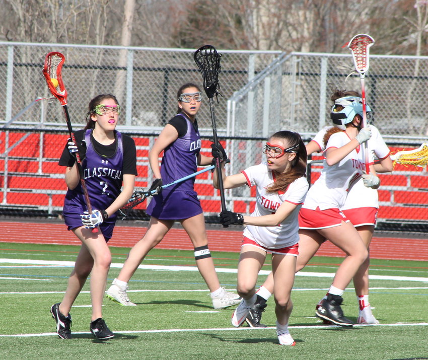 The East Providence High School&rsquo;s Tessa Laroche (right) defends against an opponent from Classical during a Division III girls&rsquo; lacrosse contest between the sides played earlier this spring. Laroche, a co-captain, and the rest of her Townie mates are off to an impressive start in 2022.