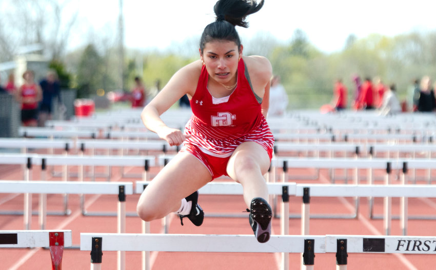 Gladys Barrera leaps a hurdle in the 110 version of the event during the Townies&rsquo; recent meet in Portsmouth.