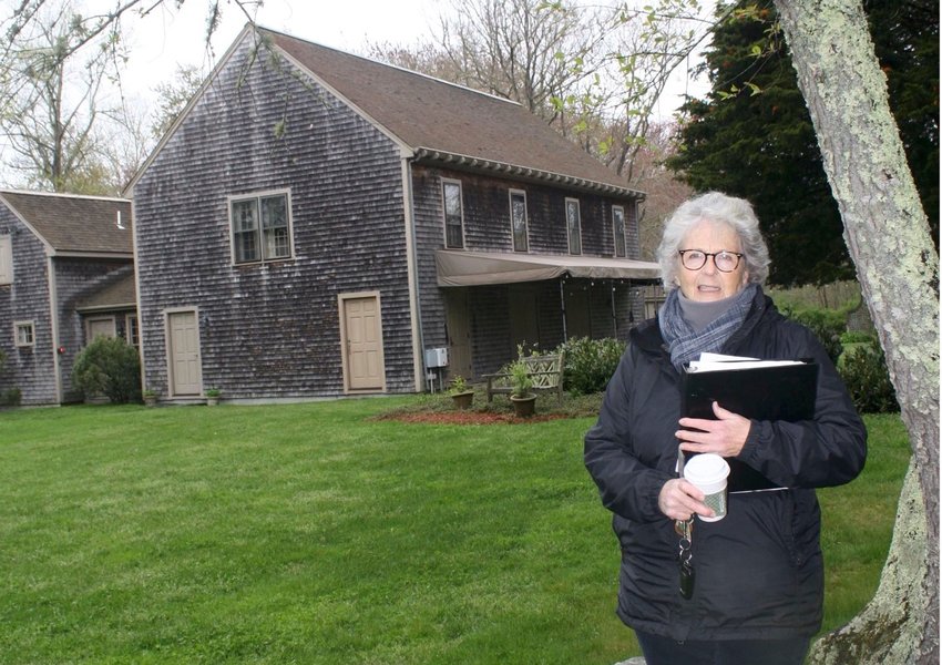 Rosalind Weir outside the Meeting House at Tiverton Four Corners.
