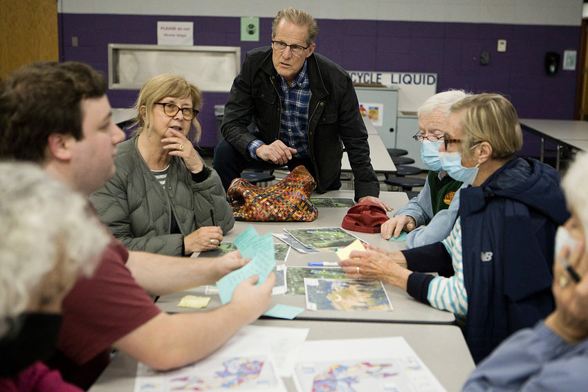 Warren residents discuss their ideas with Town Councilman Brandt Heckert for the Burr's Hill Park Activity Building during a &quot;Design Charette,&quot; on Wednesday.