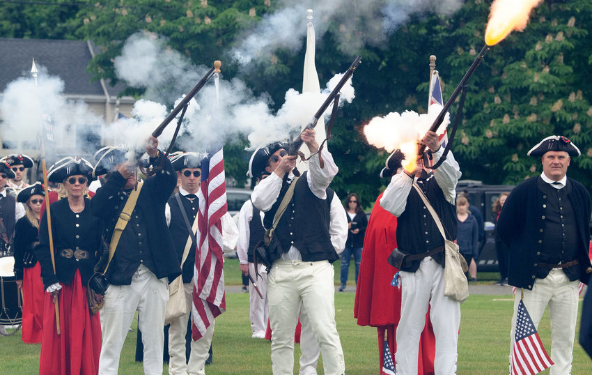 The Bristol County Fifes and Drums Corps. perform a musket salute during the 2021 Memorial Day Observance in Bristol.