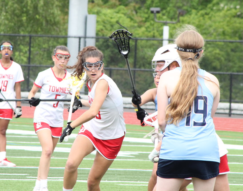 Riley Grant scores the last of her four goals for the EPHS girls' lacrosse team in the Townies Division III quarterfinal win over Johnston on Saturday, May 28.