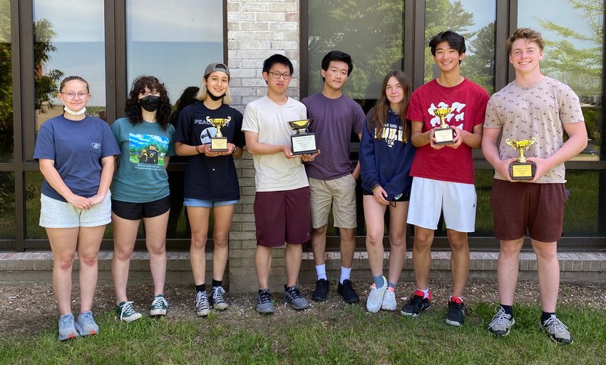 Barrington High School&rsquo;s Emma Marvelli, Stella Densley, Louise Marie Choi-Schattle, Yike Chen, Yiming Xiong, Helen Copple, Dawen Cheng and  Sean Fearon (from left to right) brought home the top team award at the recent URI Chemistry contest.