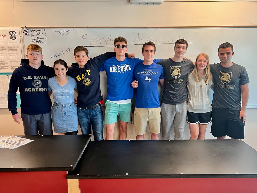 These eight Portsmouth High School seniors are going on to service academies this month (from left): Colby Fahrney (USNA), Amory Kirwin (USNA but deferred for one year due to injury), James Andersen (USNA), John Maedke (USAFA), Garen Seibert (USAFA), Jack Pacheco (USMA), Maria Chytka (USMA), and Ethan Courville (USMA). This photo was taken after an informational session the seniors presented to younger PHS students.