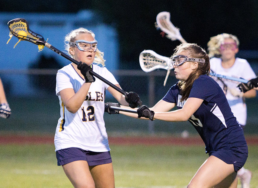 Charlotte Danyla sends a pass over a South Kingstown opponent.