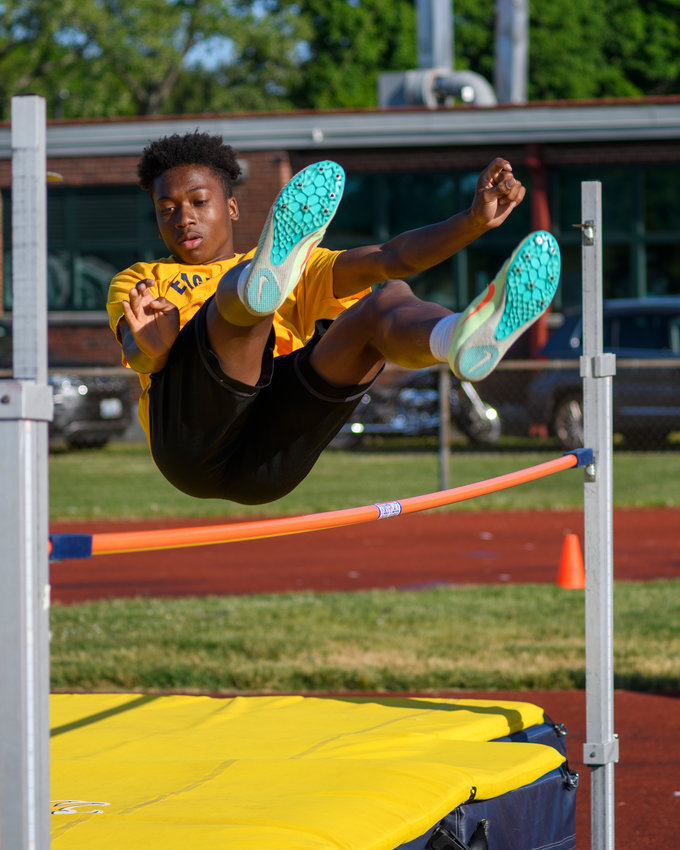 Caleb Satisfield, shown competing at the division championship, won the high jump at the state championship.
