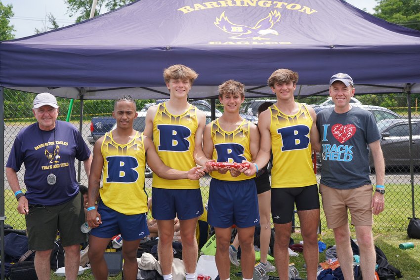 Members of the school record-setting 4x100-meter relay team pose for a photo after running in the New England Championships in New Britain, Conn. on Saturday. Pictured are (from left to right) Coach Mike Katz, Jackson O&rsquo;Connor, Iain DeBoth, Andrew Blazewicz, Nate Greenberg and Coach Bill Barrass.