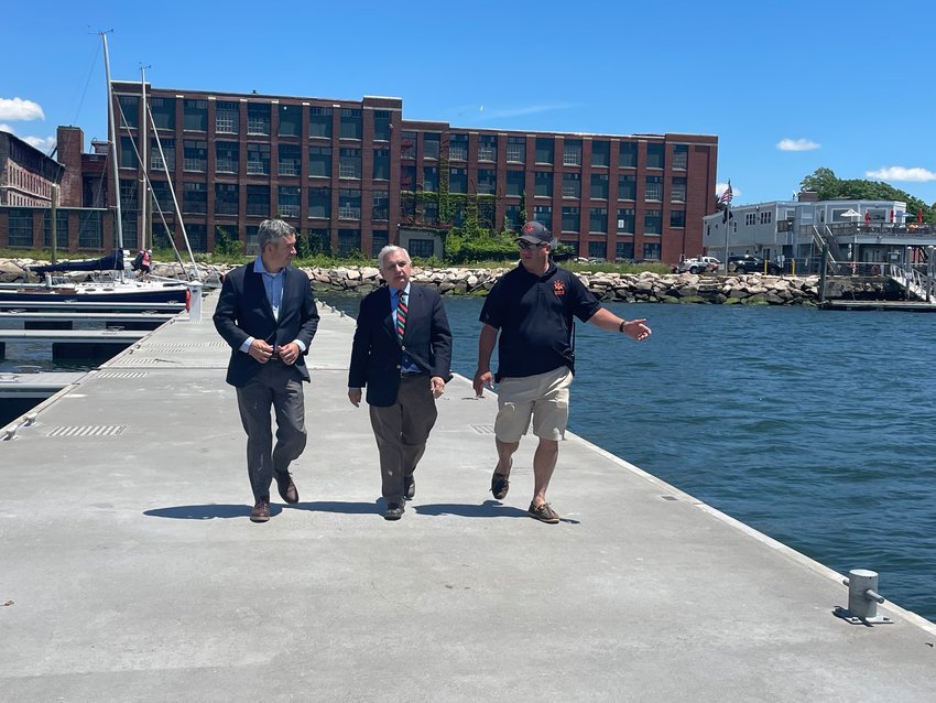 Town Administrator Steven Contente (left) and Harbormaster Gregg Marsili (right) took Senator Jack Reed on a tour of Bristol&rsquo;s new marina on Friday, June 10.