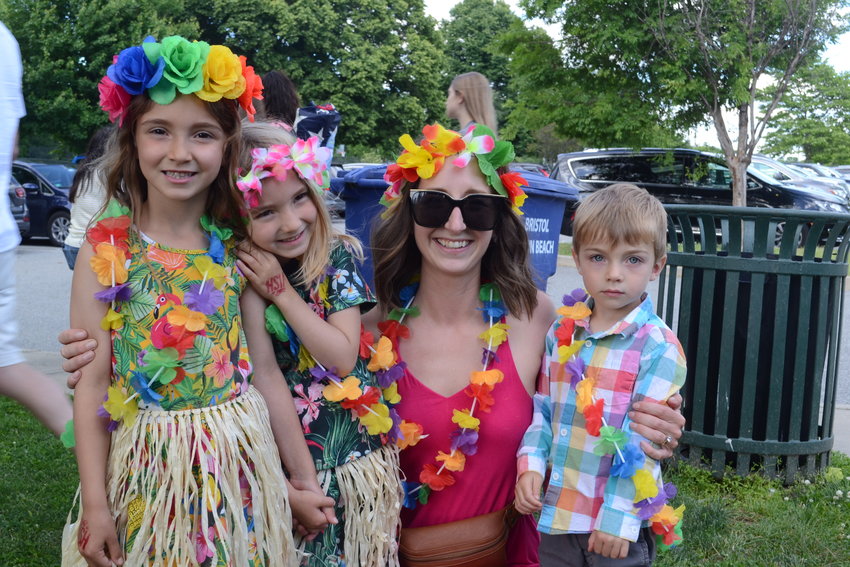Jenna Pellerin, along with daughters Lilly and Abby and son, Elliott, were properly decked out for an island paradise celebration at the Bristol Town Beach on Friday.