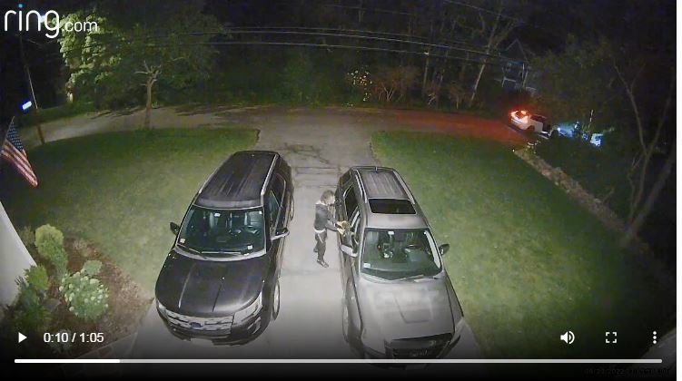 A suspect checks out a vehicle parked outside a Barrington home at about 3:15 a.m. on Monday, June 20. Police said two vehicles were stolen from residents' driveways on Governor Bradford Drive and Chapin Road.
