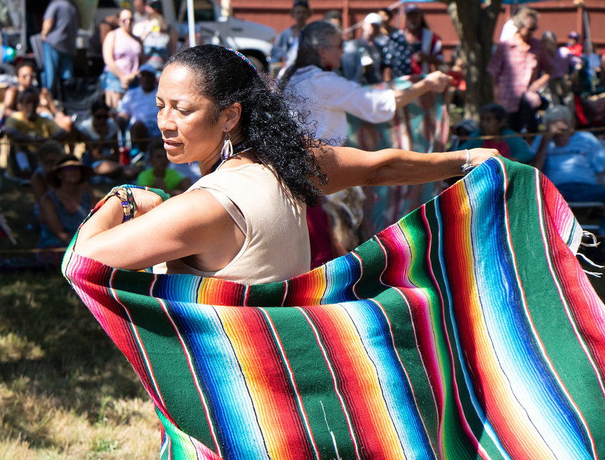 Pokanoket Sachem Chief Tracey Dancing Star Brown performs a blanket dance with other women of the tribe during Pokanoket Heritage Day at Burr&rsquo;s Hill Park on Sunday. The event featured Native American singing, dancing, drumming, storytelling, presentations and displays on Pokanoket history and culture.&nbsp;