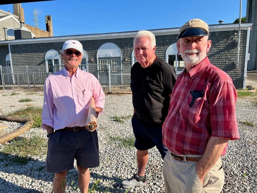 Tiverton Harbor Commission vice chairman Dave Stewart (left), who formerly ran a kayak rental shop out of the marina, Tom Fennessey (center) and former marina owner Frank Chase wait for Tuesday morning's tour to begin.