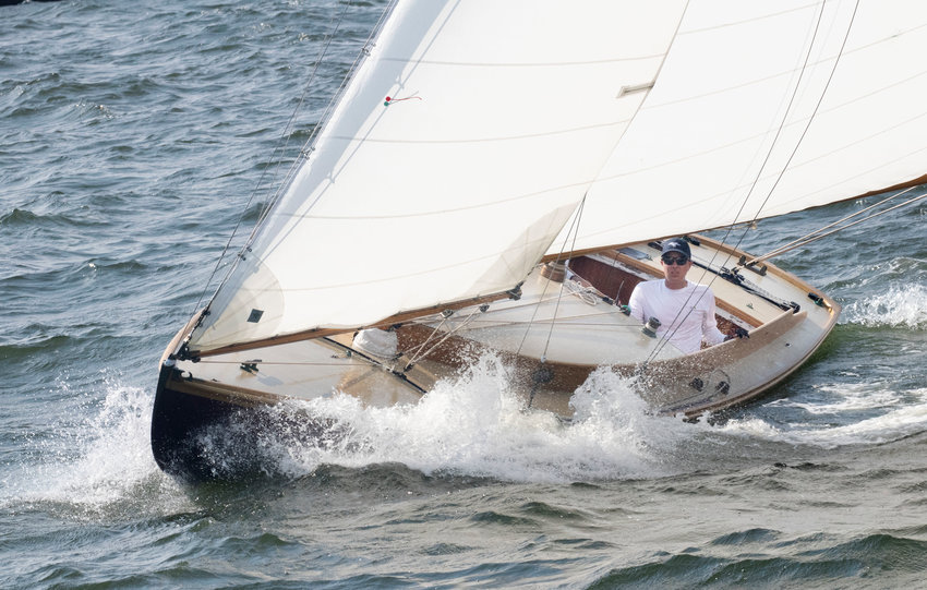 Arete with Tim Palmer at the helm, sails to a mooring at Herreshoff's.