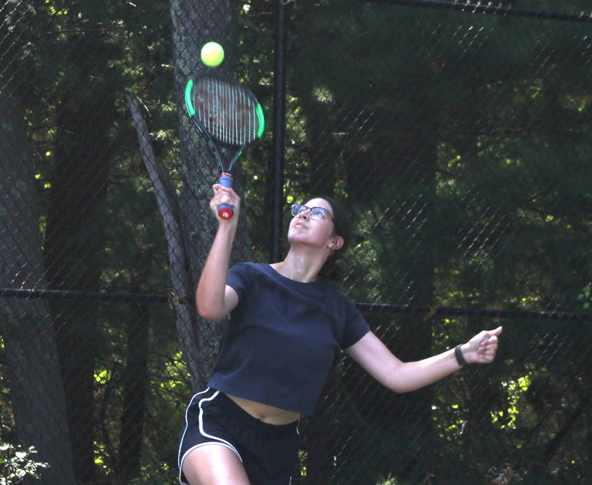 East Providence High School senior captain Jaelyn Dasilva serves during a recent ladder match with teammate Lena Shanty. Dasilva and Shanty, for the second fall in a row actually, began the 2022 season this week as the Townies' Nos. 1 and 2 singles players, respectively.