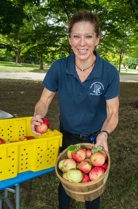 Kelli Kidd of Portsmouth, nutrition specialist at Health Services and in the Athletics Department at the University of Rhode Island, is among the community volunteers who share vegetables grown at URI&rsquo;s Agronomy Farm.