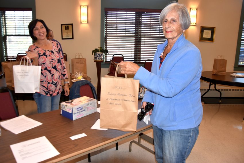 The first in a series of &quot;Take-Out Thursday&quot; events at Holy Angels Church was a big success recently. Here, parishioners Patti Stanzione (left) and Mary Lou Natale were all smiles following the first offering last month. Round two is scheduled for Oct. 20.