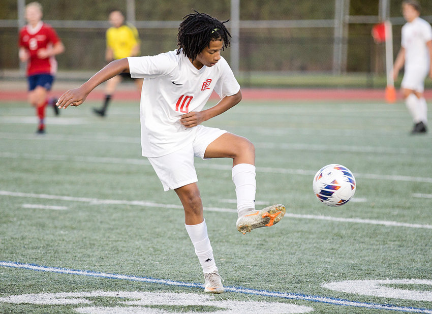 East Providence High School's Ricardo Lima makes a play on the ball during a boys' soccer game earlier this fall. Lima scored a goal and assisted on the game winner as the Townies earned a spot in the upcoming Division I state championship playoffs with a 2-1 win over Classical on the road to close last week.