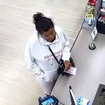 A screen capture of the female suspect in the Walgreens counterfeit bill case.