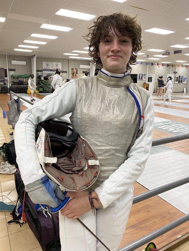 Cora Powledge of Portsmouth won a gold medal at the Division II/III qualifying fencing tournament held at the Boston Fencing Club earlier this month. She will compete in the Summer Nationals in Columbus, Ohio, from June 29 to July 8.