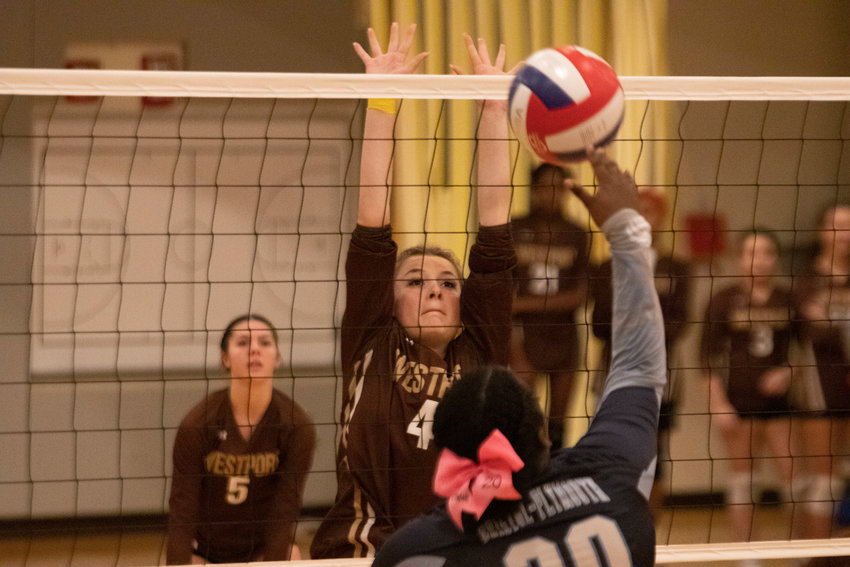 Zoey Sylvain sets up to make a block during the Wildcats 3-0 victory over Bristol Plymouth during their senior night game on Wednesday night.