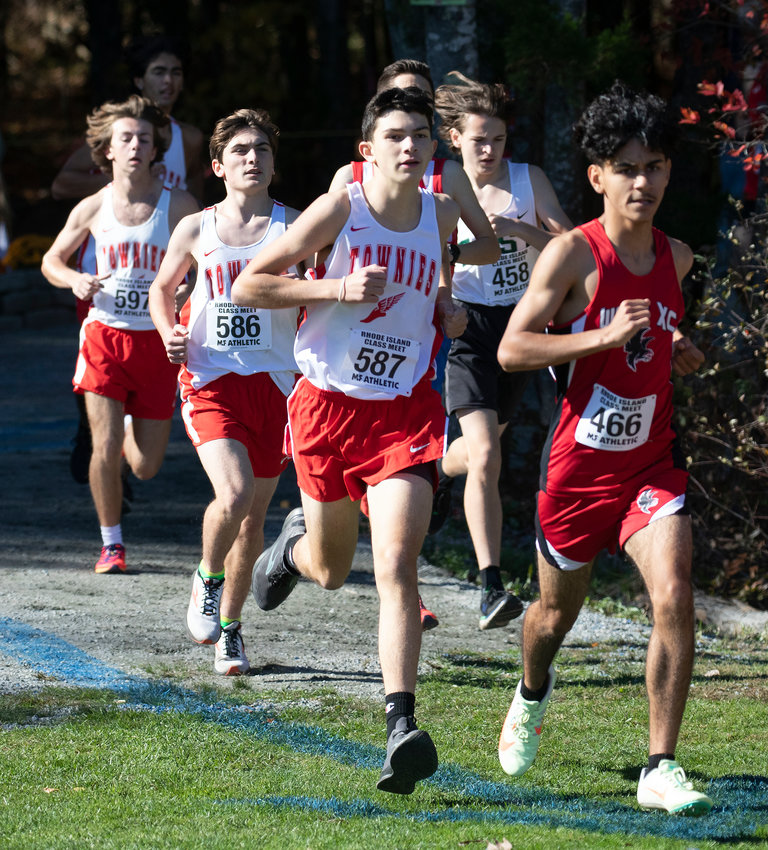 East Providence High School&rsquo;s Jordan O&rsquo;Hara, Tyler Robinson, Roger Beaudet and Connor Cirello (from back left to front right) run as a pack for the Townies during the boys&rsquo; Class A Championship Meet Saturday, Oct. 29, at Ponaganset High&rsquo;s Covered Bridge Trail.