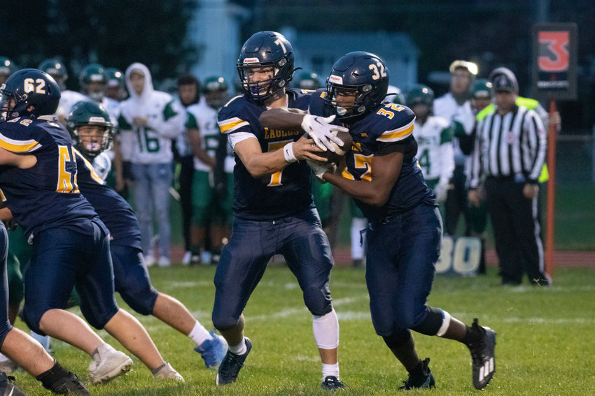 BHS quarterback Alex McClelland and running back Payton Murphy, shown during an earlier game this season, combined for the Eagles' four touchdowns in the overtime win over Woonsocket on Friday night.