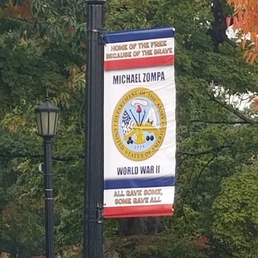New banners are hanging from light poles in town, each one honoring a Barrington veteran who died while serving this country.