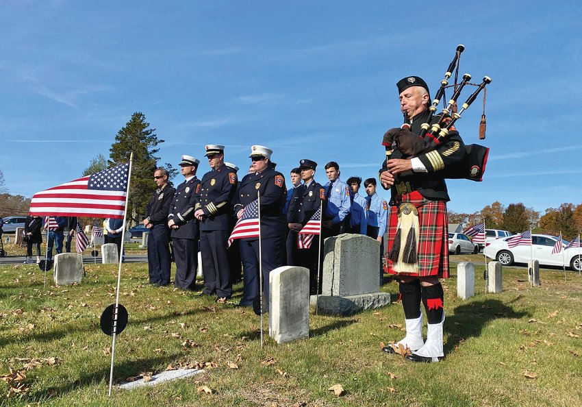 A bagpiper from the Westport Fire Department plays during the town's Veterans' Day ceremony last November. This year's ceremony is Friday.