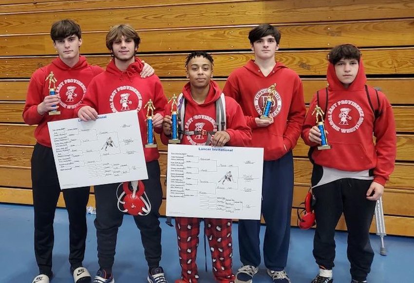 EPHS wrestlers Jacob Poore, Robbie Amaral, Martim Moniz, Jacob Francis and Charlie Phillips (from left to right) placed at the Lancer Invitational in Waterford, Conn., last weekend. Moniz (center) defended his tourney title at 120 pounds.