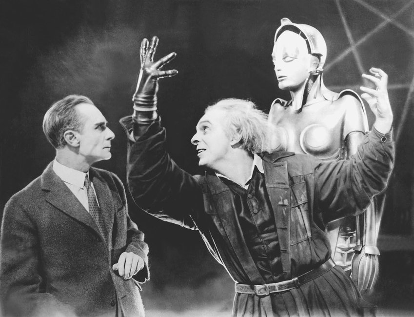 Industrialist Joh Frederson (Alfred Abel) looks on as scientist Rotwang (Rudolf Klein-Rogge) outlines his vision for a human-like robot in &quot;&rsquo;Metropolis&quot; (1927). The landmark science fiction film will be screened with live music by Jeff Rapsis on Tuesday, Dec. 27 at 7 p.m. at the Jane Pickens Theatre Film and Event Center.