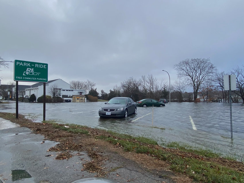 The County Road park and ride lot was completely flooded on Friday morning, Dec. 23.