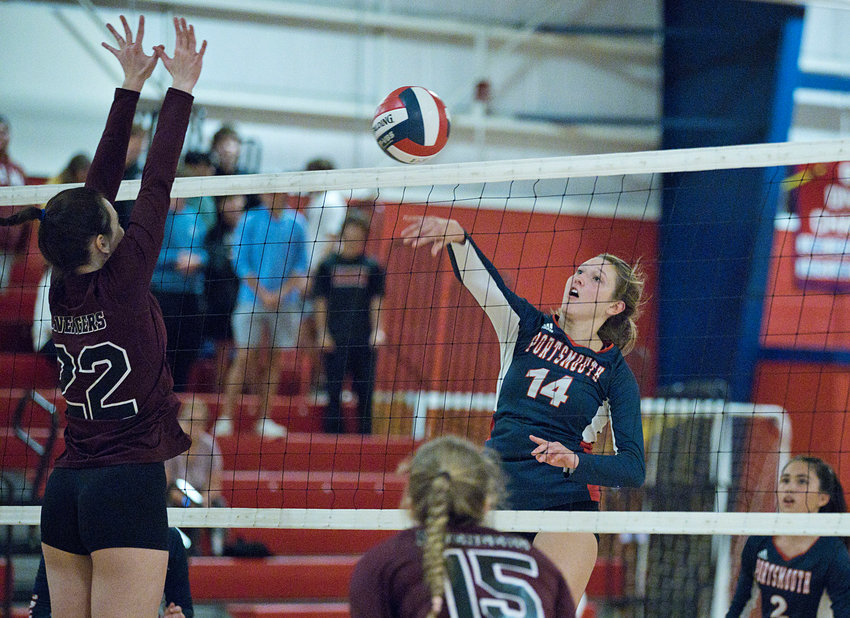 Morgan Casey of Portsmouth High School, here firing one over the net during a playoff win against East Greenwich in November, has been named the 2022-23 Gatorade Rhode Island Volleyball Player of the Year.