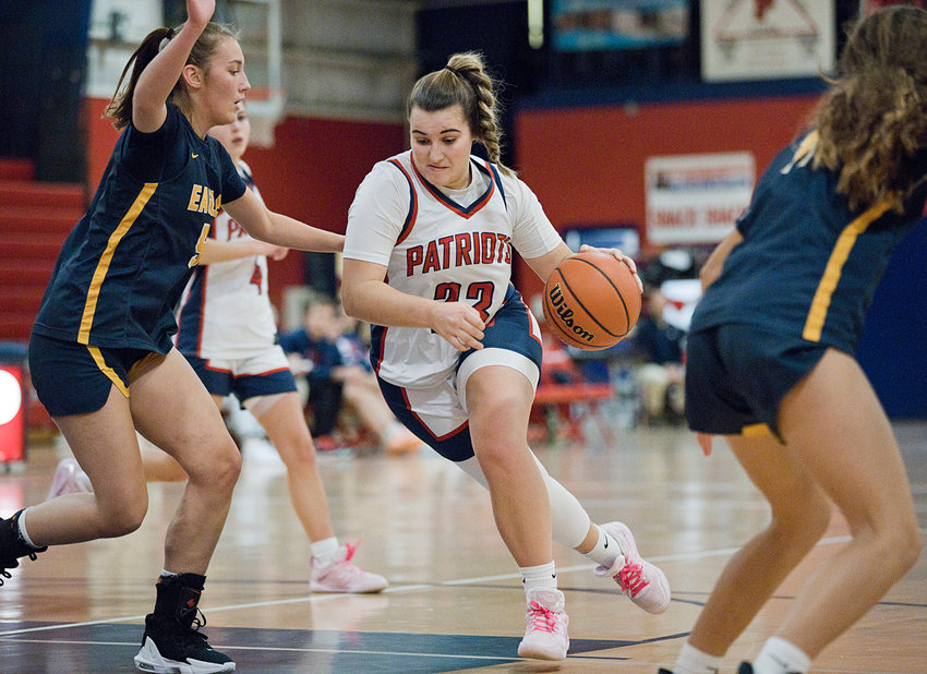 Emily Maiato powers through the Barrington defense to reach the hoop in the Patriots&rsquo; 49-46 win Monday night. Maiato led the Patriots with 17 points.