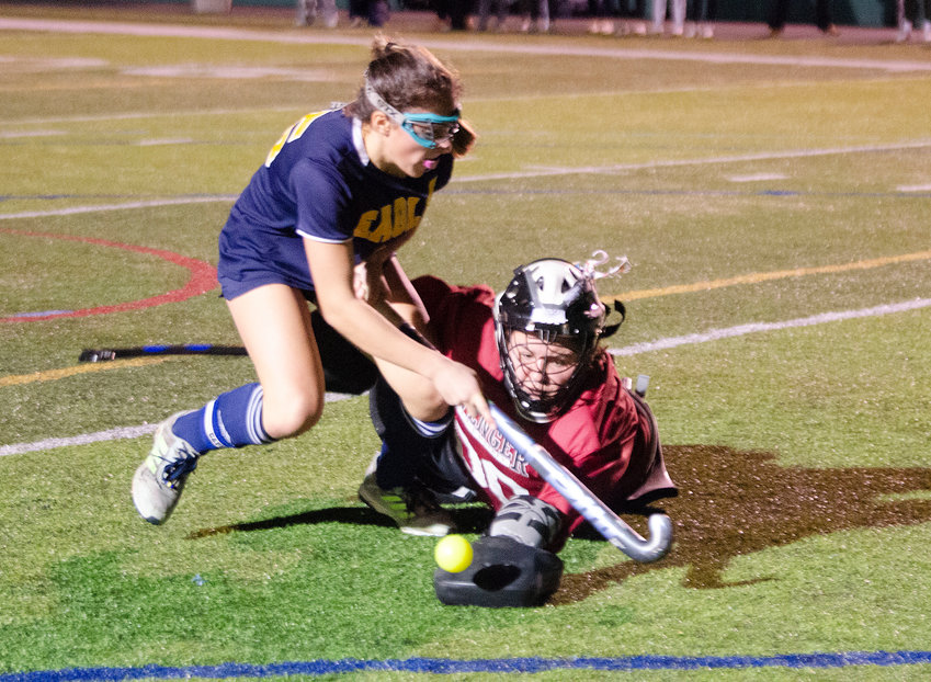 The Barrington High School field hockey team, shown playing on artificial turf in a playoff game, has taken it upon themselves to find an artificial turf field to practice on. The team raises money through cookie dough sales and other fund-raisers to pay rental fees for the artificial turf field in Seekonk.&nbsp;