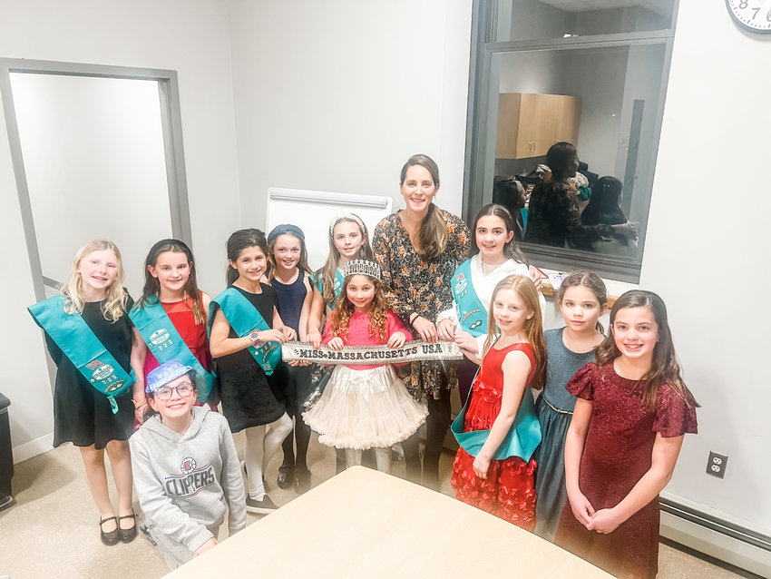 Members of Barrington Junior Troop 723 pose for a photo with Cristina Nardozzi Buehrer following a special event earlier this month. Pictured are (from left to right) Addison Lubelczyk, Claire Egal, Graysen Mello-Dumas (kneeling), Avery Martin, Grace Gavigan, Camille Piccerelli, Ava Buehrer, Cristina Nardozzi Buehrer, Laura Thurston, Lily DiAngelo, Claire Moniz, and Emma Valentine.