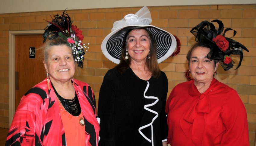 Winners in the Saturday's St. Elizabeth&rsquo;s Church Holy Rosary Sodality Tea Party Hat Contest were (left-right): Belle McGowan, Jorgina Lombardo, and Sue Carinha.