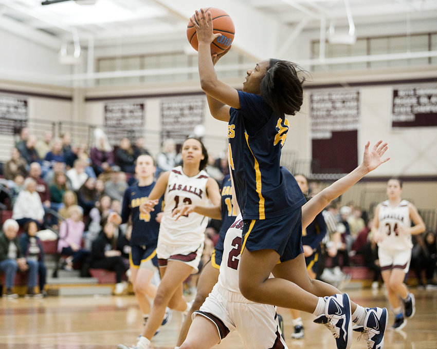 Janaya Prince Baquero takes a jumper during the first half of Monday's quarterfinal match against LaSalle.