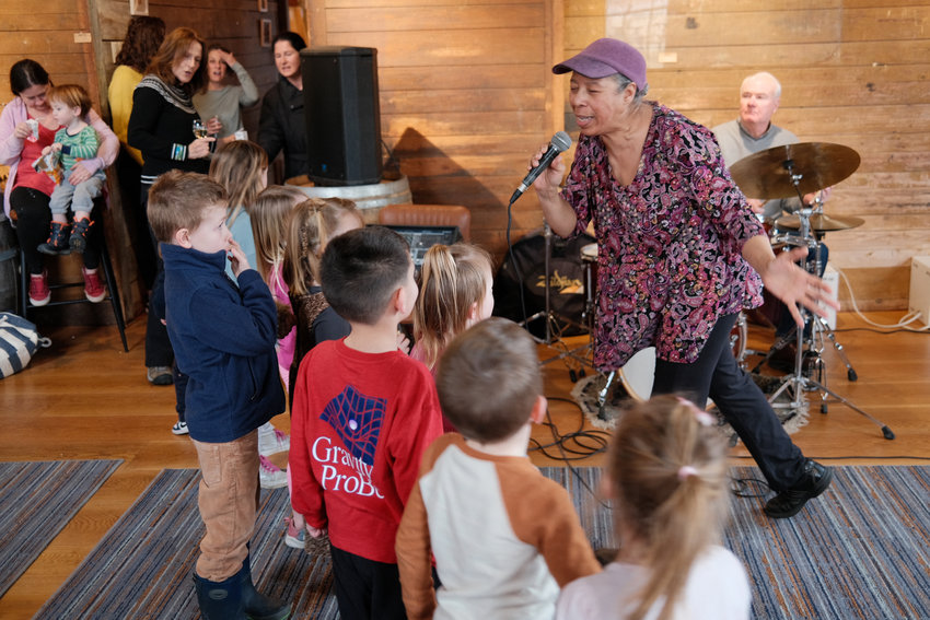 Vocalist Tish Adams leads a group of children in yelling &ldquo;Wilma!&rdquo; during a jazzed-up version of &ldquo;Meet the Flintstones&rdquo; during the annual Jazz for Kids program at Greenvale Vineyards on Thursday. The event was part of the Newport Winter Festival.