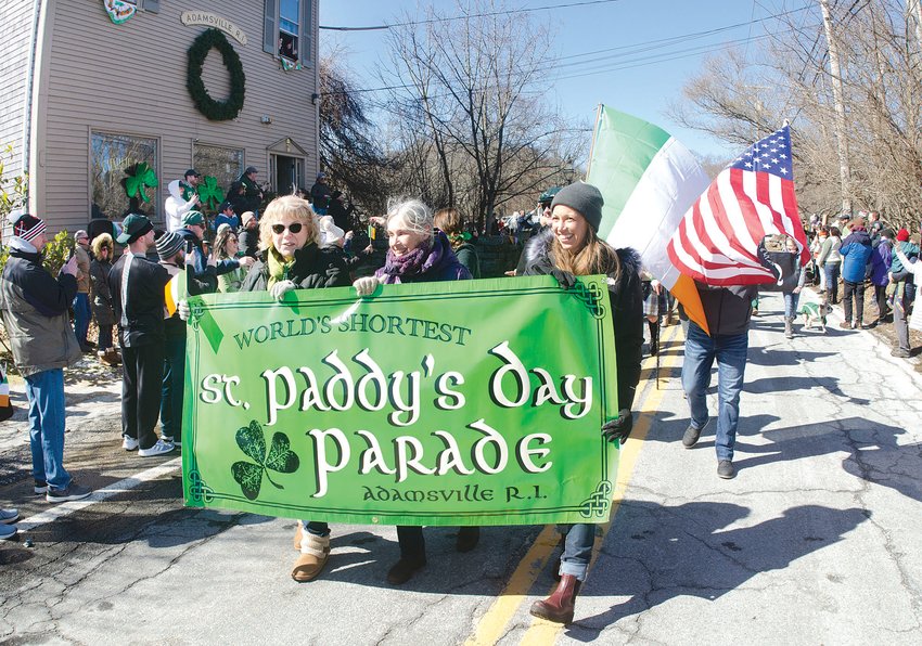 Marchers make their way down Main Road in Adamsville during last year's inaugural running of the 'World's Shortest St. Patrick's Day Parade.'